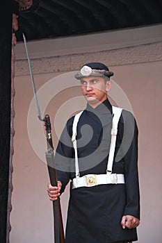 Nepalese guard standing.
