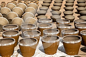 Nepalese pots dry in the sun