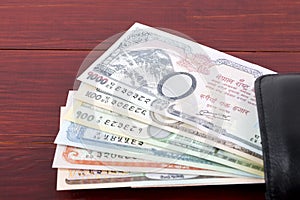 Nepalese Rupee in the black wallet