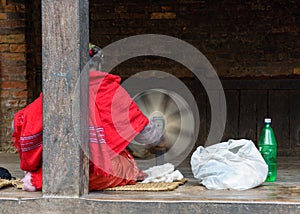 Nepalese woman spinning wool