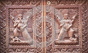 Nepalese wooden carving with Ganesha and Kartikeya Hindu Gods