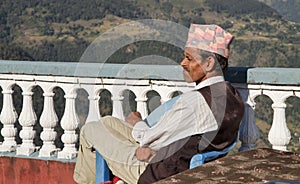 Nepali men resting before hike photo