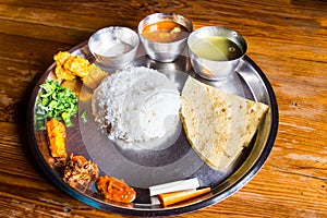 Nepali Thali meal set with curry chicken