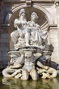 Neptune fountain on Albertinaplatz square in Vienna, Austria
