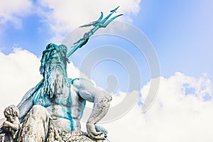 Neptune fountain in Alexanderplatz square. Fragment. Berlin, Germany