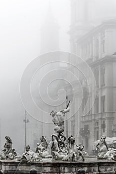 Neptune fountain in the fog