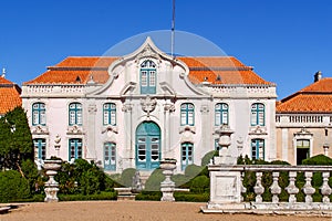 Neptune gardens (baroque) and one of the facades of the Queluz Royal Palace (Portugal). photo