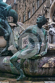 Neptune`s fountain detail in Florence