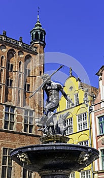 Neptune`s Fountain in front of vintage architecture of Old Town - Long Market, Gdansk, Tricity, Poland