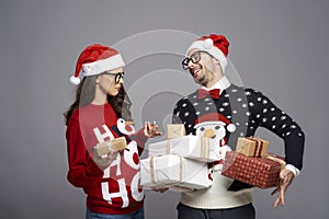 Nerd couple exchanging Christmas presents