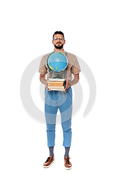 Nerd holding books and globe and looking at camera on white background