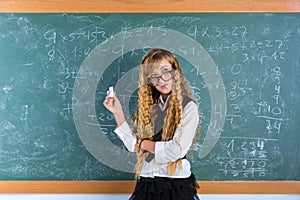 Nerd pupil blond girl in green board schoolgirl