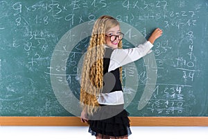 Nerd pupil blond girl in green board schoolgirl