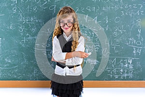 Nerd pupil blond girl in green board schoolgirl