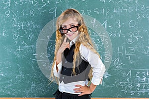 Nerd pupil blond girl in green board schoolgirl