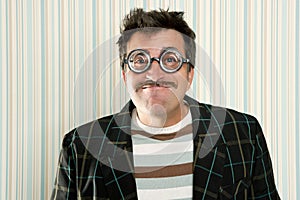 Nerd silly crazy myopic glasses man funny gesture photo