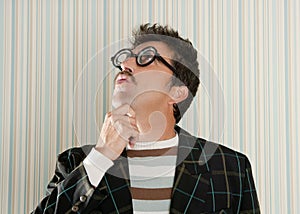 Nerd silly crazy myopic glasses man funny gesture photo