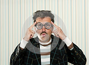 Nerd silly crazy myopic glasses man funny gesture photo