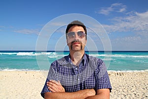 Nerd tourist mustache on caribbean beach