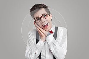 Nerdy man awing with opened mouth