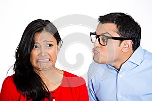 Nerdy man trying to kiss snobby woman