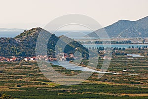 Neretva valley with hills and sea in background