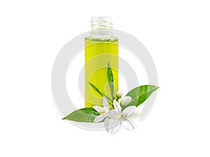 Neroli essential oil and orange flowers isolated on white