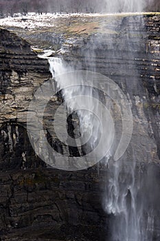 Nervion river source and waterfall with wind