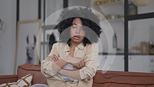 Nervous angry young woman throwing away papers crossing hands sighing. Portrait of overburdened African American lady