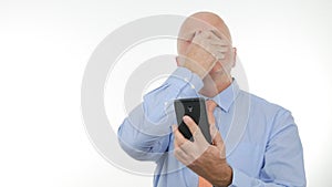 Nervous Businessman make Nervous Gestures Reading Bad News on Mobile
