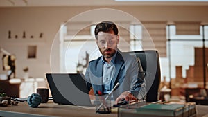 Nervous man answering call at computer desk workplace. Businessman screaming