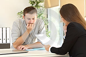 Nervous man in a job interview photo