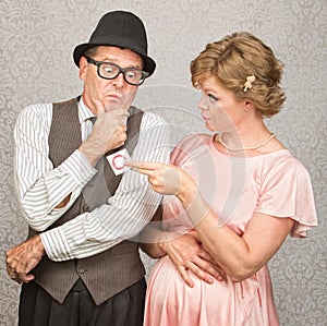 Nervous Man and Lady with Contraceptives photo