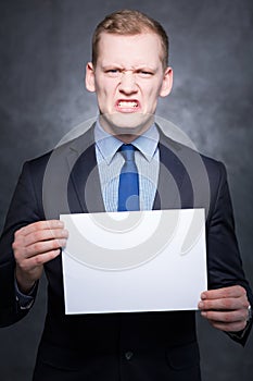Nervous man in a suit photo