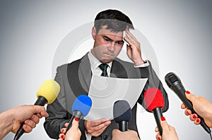 Nervous man is sweating, he afraid of public speech photo