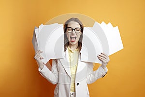 nervous woman in white suit holds papers and screaming, girl manager in stress, office worker with deadlines