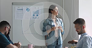 Nervous young female conference speaker feeling unconfident before presentation.