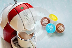 Nescafe Dolce Gusto coffee machine with Nescafe Dolce Gusto capsules. Selective focus