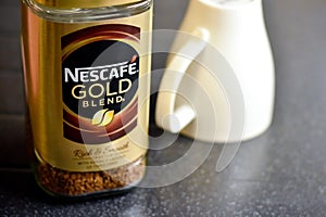 Nescafe Gold Blend instant coffee and cup