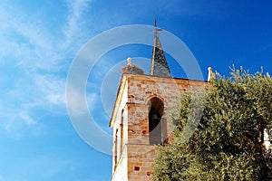 Nest of storks in a church steeple