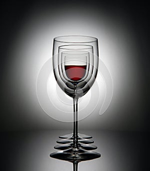Nested glasses of wine photo
