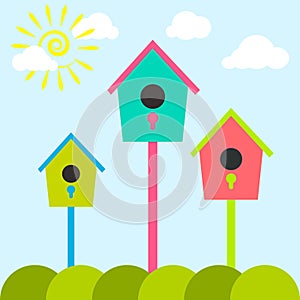 Nesting box cartoon set. Meadow with colorful bird houses.