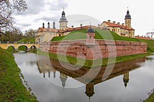 Nesvizh castle Palace and castle complex in Nesvizh, Belarus. Known since 1583. Moat with water in front of the castle