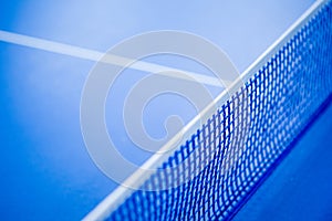 Net on blue ping pong table