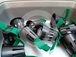 Net pots and plastic containers for hydroponic growing equipment.