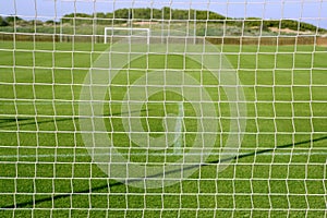 Net soccer goal football green grass field