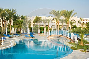 Net for water volleyball over the swimming pool at the resort. E