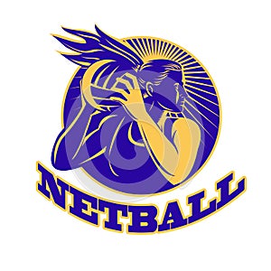 Netball player holding passing ball