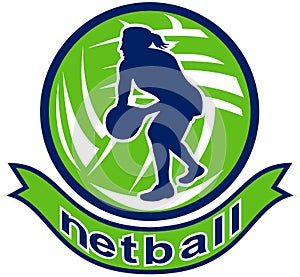 Netball player passing ball
