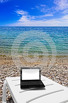 Netbook on beach